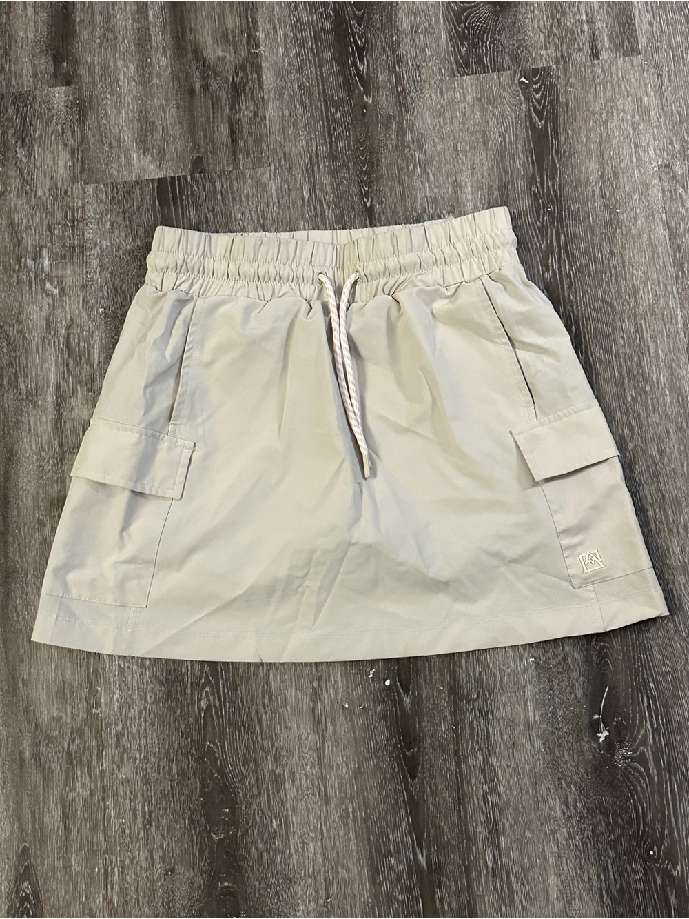 Avalanche Women's Cargo Drawstring Mini Skirt in Light Tan